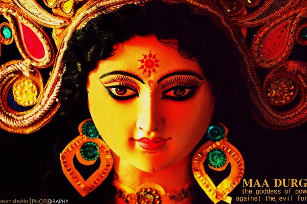 भारतीय गुड़िया के साथ एक लाल डॉट